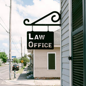 Clear sign on building identifying it as a law office -  Whitley-Sebti Law